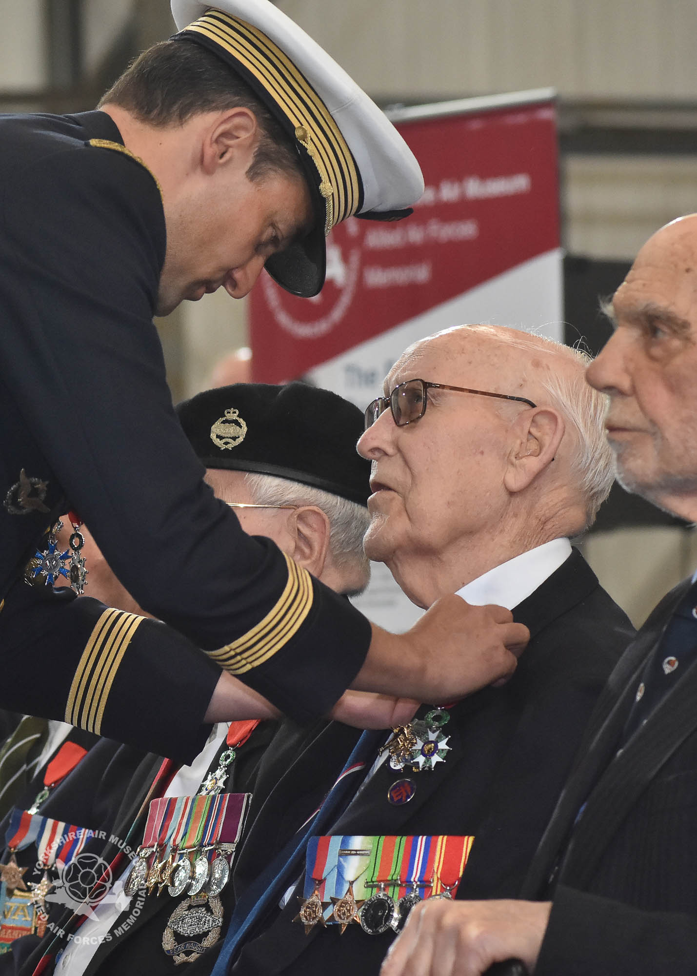 Legion d'Honneur medals presented to 21 Normandy Veterans at Yorkshire Air Museum on Sunday 22nd May, 2016. Pictured is Reginald Deighton of Acomb, York, who recieved the medal from Colonel Bruno Cunat, French Liasion Officer to the Ministry of Defence. Picture David Harrison/ Yorkshire Air Museum. (Able Seaman, Royal Navy, Crewman/Oerlikon gunner on Landing Craft Tank 2345. Landed Juno beach 07.30am 6th June)