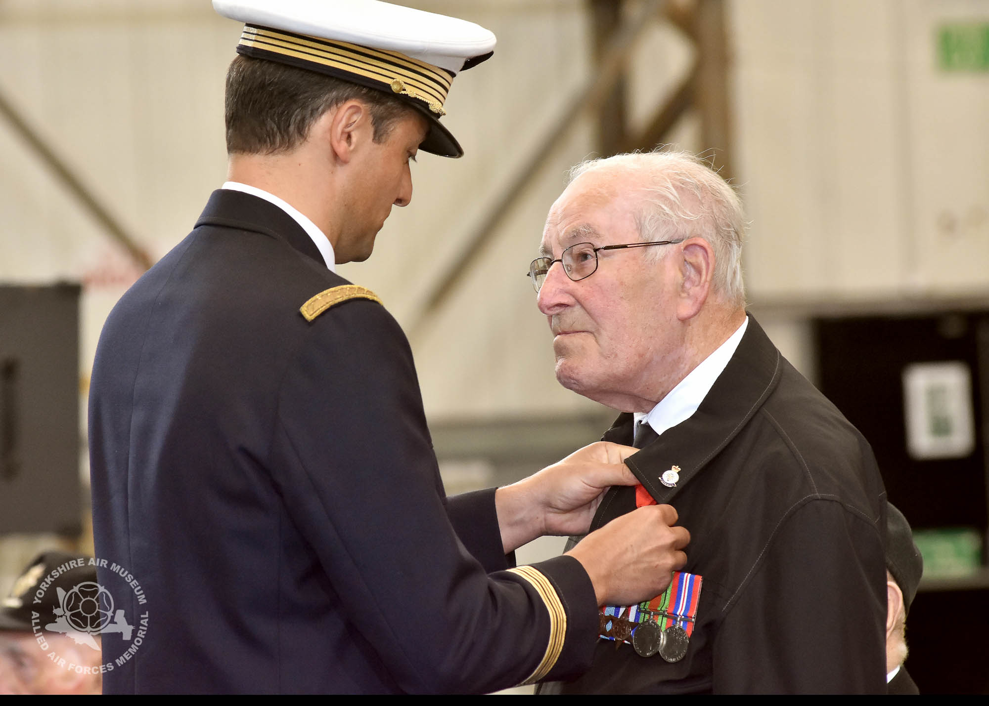 Legion d'Honneur medals presented to 21 Normandy Veterans at Yorkshire Air Museum on Sunday 22nd May, 2016. Pictured is Ernest Naylor of Sunderland, who recieved the medal from Colonel Bruno Cunat, French Liasion Officer to the Ministry of Defence. Picture David Harrison/ Yorkshire Air Museum. (Sapper Survey Company 519 Army. Loaded a water truck on cargo ship, landed 07.06.44 establishing a base at a farm in Esquary Sur Surlles. Progressed through Falaise, Rouen, Amiens and Valenciennes to Schepdael in Belgium.)