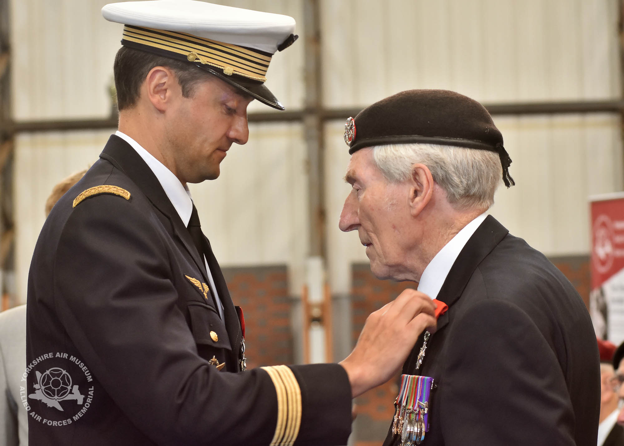 Legion d'Honneur medals presented to 21 Normandy Veterans at Yorkshire Air Museum on Sunday 22nd May, 2016. Pictured is Ken Smith of Wheldrake, York, who recieved the medal from Colonel Bruno Cunat, French Liasion Officer to the Ministry of Defence. Picture David Harrison/ Yorkshire Air Museum. (Private 5th BAttalion Duke of Cornwall's Light Infantry. Served in Normandy from D-Day. Wounded in action on 20th October 44 and evacuated by Dakota air ambulance to UK)